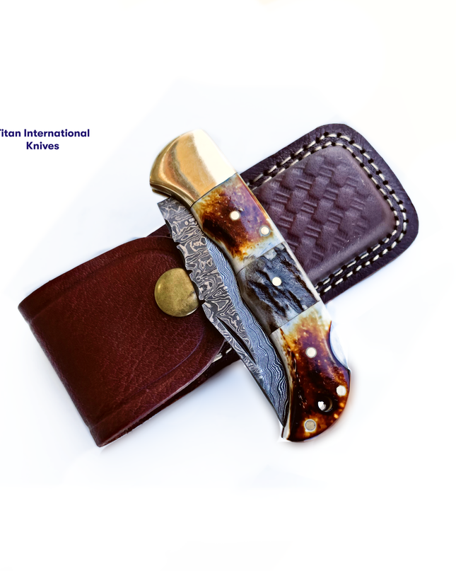 Burnt Bone and Stag Horn folding knife with Leather Sheath