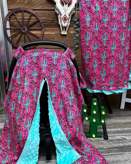 CACTUS PRINTED ON FUSCHIA CAR SEAT COVER. ZYTG25153026 M