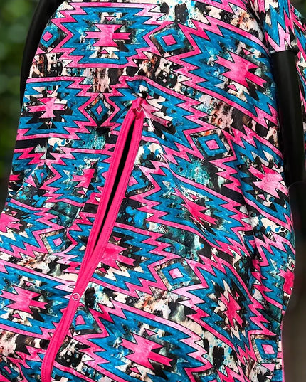 AZTEC PRINTED CARSEAT COVER W/ORANGE SOFT FABRIC.
