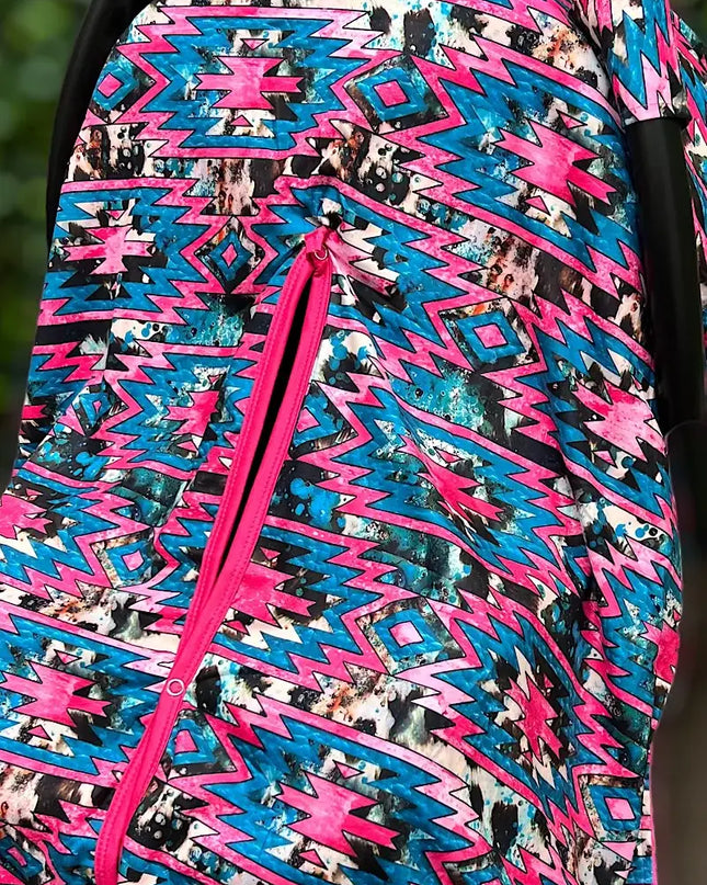 AZTEC PRINTED CARSEAT COVER W/ORANGE SOFT FABRIC.