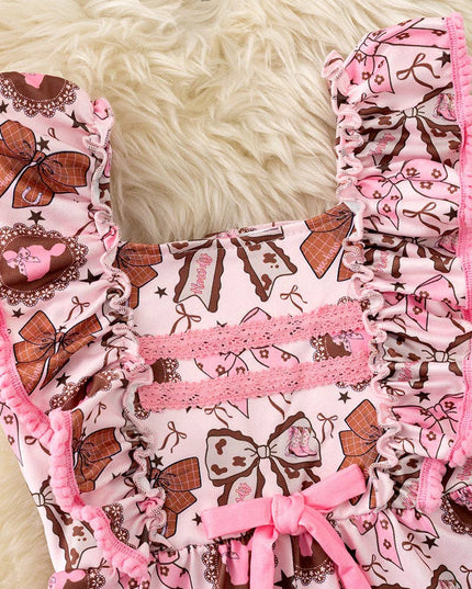 Coquette western bow printed pink & brown girls romper. PNG60128 SOL