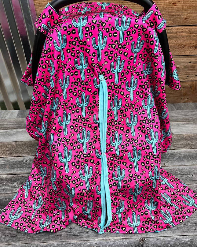 CACTUS PRINTED ON FUSCHIA CAR SEAT COVER. ZYTG25153026 M